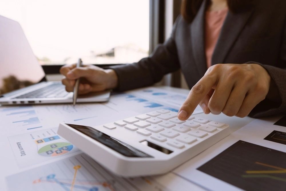 Accountant reviewing financial charts